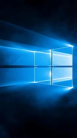 Luminous quadrilateral window icon with volumetric light rays.