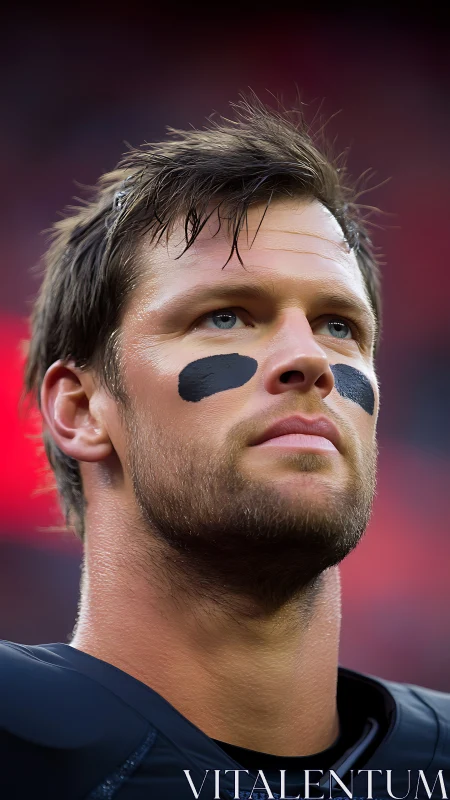 Focused football player gazing ahead with calm confidence.