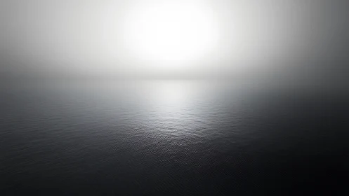 Quiet horizon glows softly above calm, rippled water