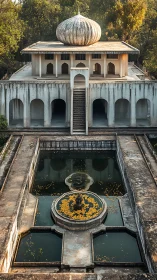 Serene Mughal garden pavilion reflects softly in still water