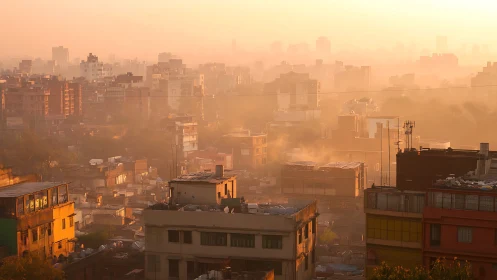 Urban skyline dissolves into golden atmospheric haze at sunrise