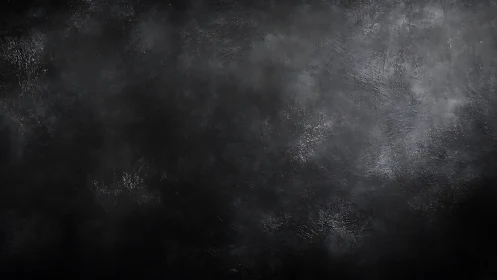 Dark textured concrete wall background with subtle light play.