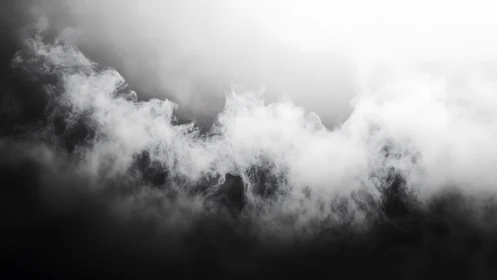 Monochrome horizontal band of dense drifting vapor clouds.