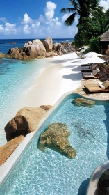 Littoral infinity pool interfacing with granitic tropical shoreline.