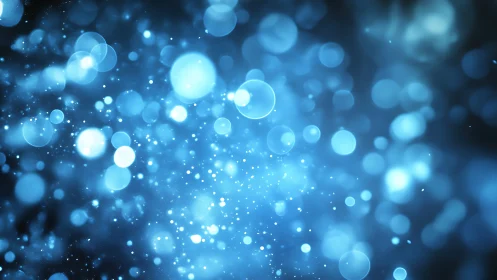 Glowing blue bokeh particles drift through a soft cosmic haze