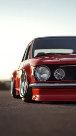 Ultra low stance classic red coupe with custom aero front