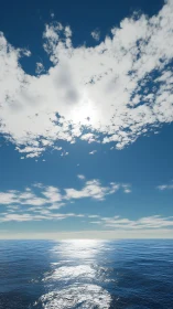 Gentle sunlight dancing over calm open ocean waters.