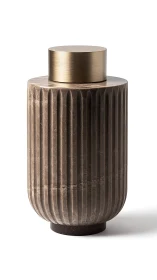 Marble column jar quietly crowns itself with brushed brass