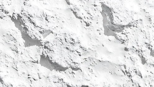 Jagged white rock texture under harsh directional light.