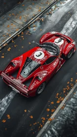 Red racing sports car on wet city street in autumn conditions.