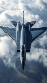 Military jet aircraft captured in vertical overhead flight