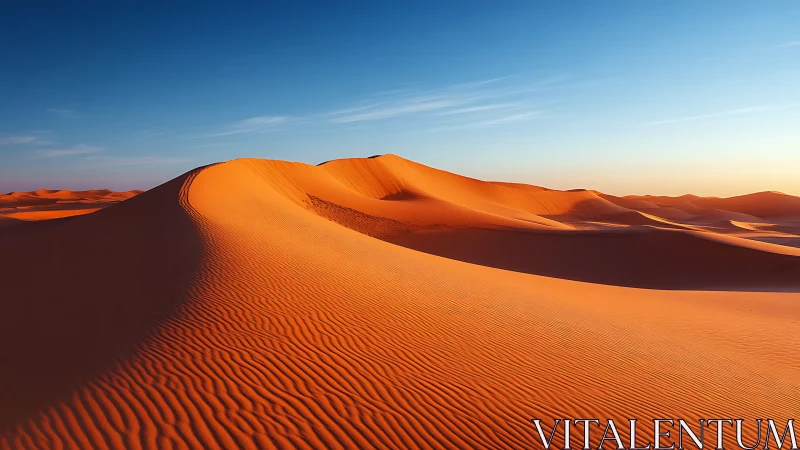 Golden desert dunes glow softly beneath a vast blue sky