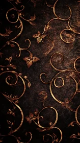 Ornate gold floral scrollwork on distressed dark leather.