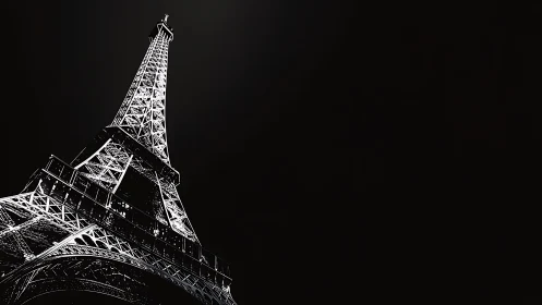 Monochrome Eiffel Tower study in stark diagonal perspective.