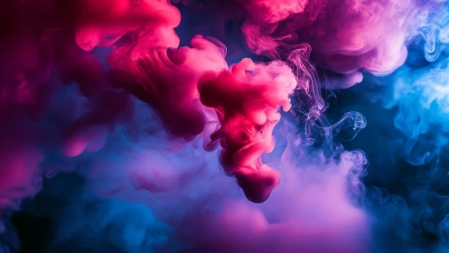 Velvet clouds of neon pink and blue drifting in darkness.