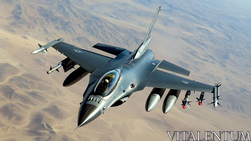 Modern fighter jet captured in dynamic aerial perspective above desert
