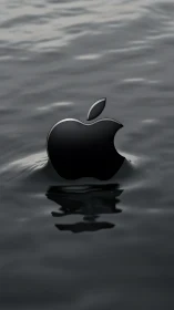 Glossy black emblem emerges from monochrome liquid surface