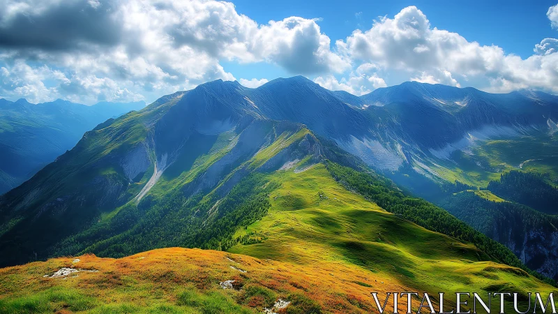 Sunlit alpine ridgeline unfolds beneath drifting clouds.