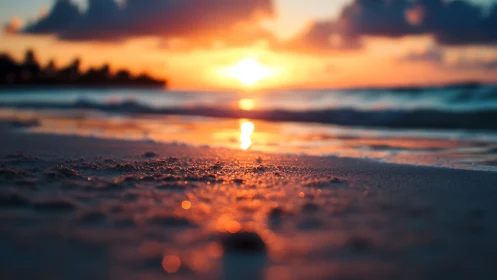 Low-angle coastal sunset with shallow DOF and bokeh highlights.