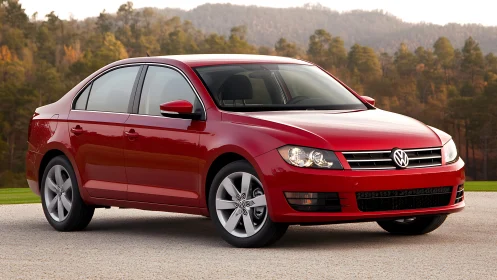 Photorealistic red sedan in three-quarter front landscape view.