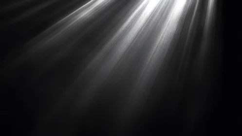 Collimated volumetric light beams cut through dense particulate haze