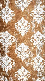 Distressed white damask motifs on textured brown background.