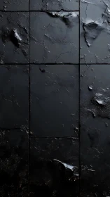 Midnight stone tiles with rugged, molten textures.