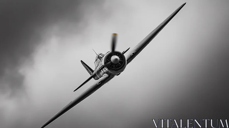 Vintage propeller warplane cuts through dramatic storm sky