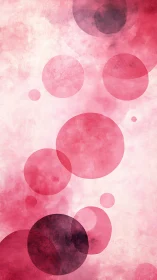 Soft red watercolor circles overlap on textured background