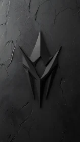 Angular black emblem rests over cracked matte stone wall.