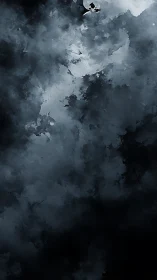 Storm-swept monochrome clouds form abstract vertical chasm.