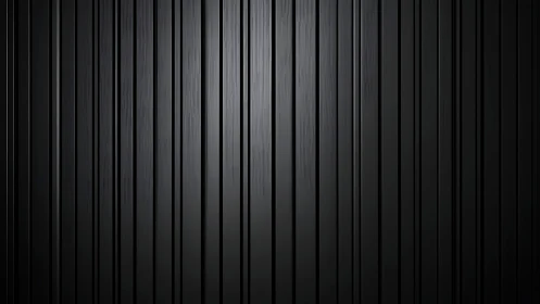 Parallel black grooves whisper in softly polished silence