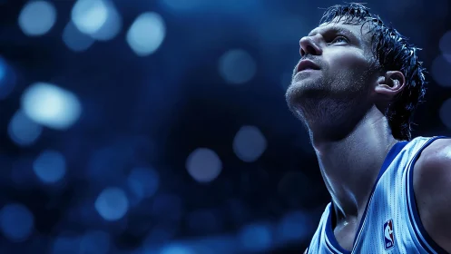 Basketball player looks upward under cool arena lights.