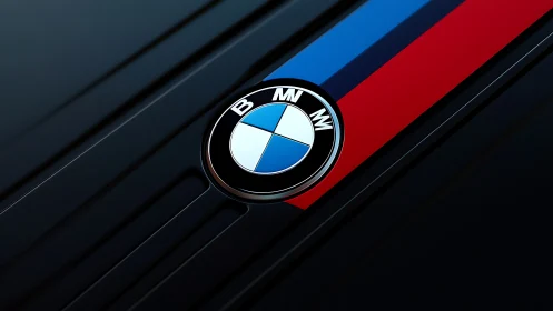 BMW hood emblem with bold M tricolor stripe design.