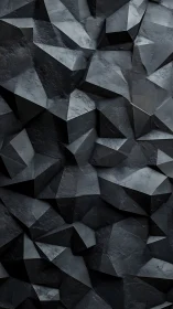 Faceted dark geometric rock surface forms angular abstract field