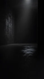 Solitary beam cutting through a wet industrial void.