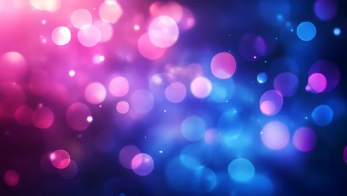 Vibrant pink and blue bokeh lights digital abstract background.