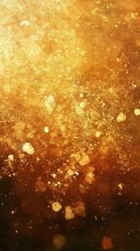 Golden bokeh particulate field with radiant glitter texture.