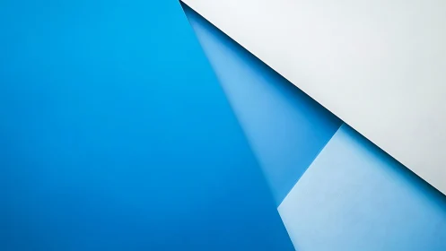 Geometric blue abstraction with layered angular planes.