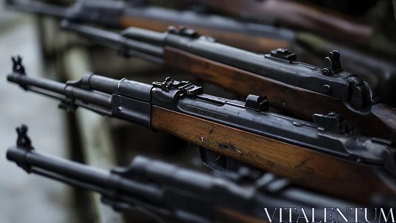 Collection of vintage rifles with wooden furniture and iron sights