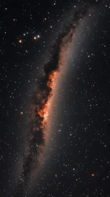 Edge-on galactic dust lane cuts glowing stellar disk.