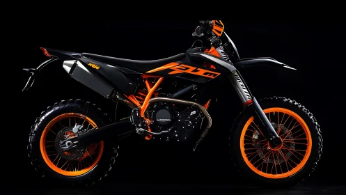 Midnight trail predator motorcycle glowing in neon orange.