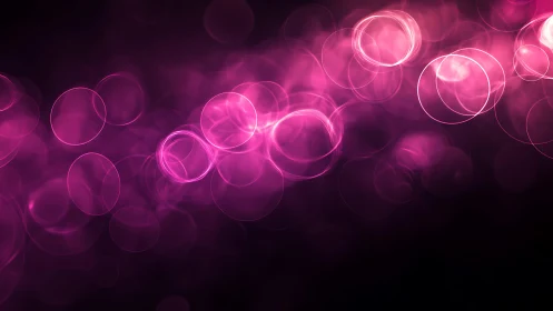 Vibrant pink bokeh circles on dark abstract background digital art.