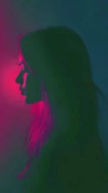 Side profile portrait glows under vivid neon pink light