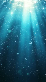 Submerged water column with downward shafts of blue light.
