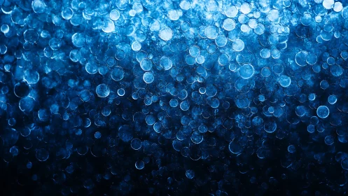 Glistening blue bubbles drifting in a dreamy night haze.
