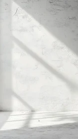 Sunlit white wall casts diagonal shadows across floor