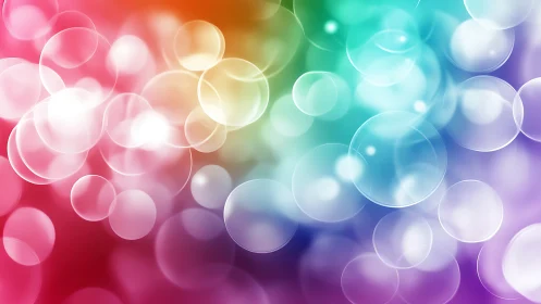 Soft translucent bokeh circles on rainbow gradient field.