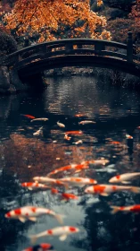 Koi glide beneath arched garden bridge in amber autumn light.