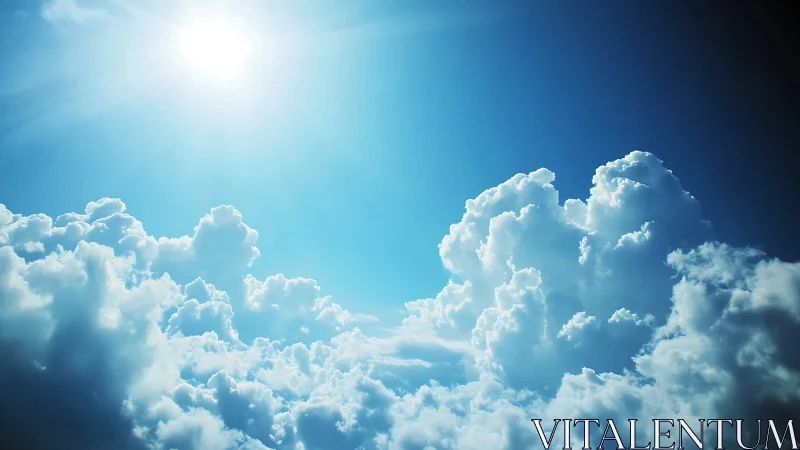 Sunlit cumulus clouds glow softly in a radiant blue sky